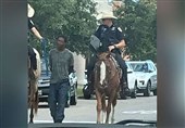 African-American Man Led by White Mounted Cops with Rope Suing Texas