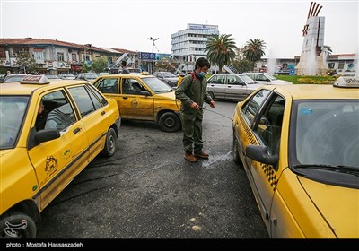 ضدعفونی کردن خودروهای حمل نقل عمومی در گرگان