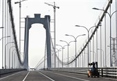 چین اولین پل معلق ریلی و جاده‌ای جهان را افتتاح کرد