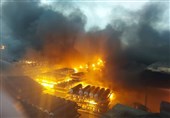 آتش‌سوزی گسترده در یک گاراژ بزرگ/ رؤیت شعله‌‌های سرکش آتش از فواصل دور + فیلم و تصاویر