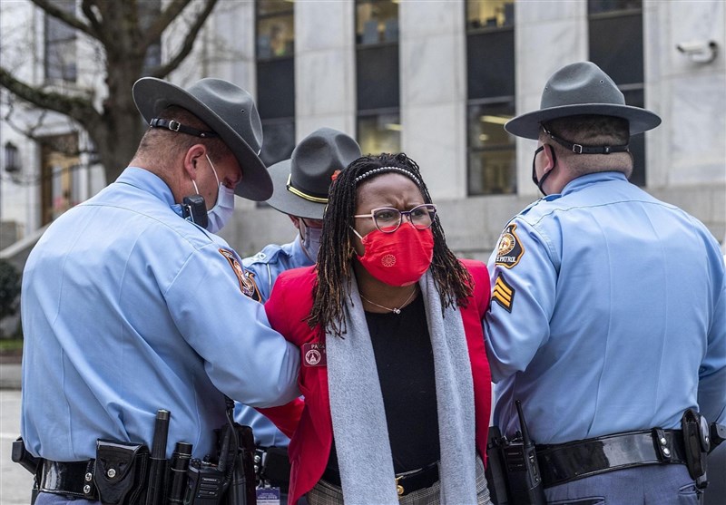 Georgia State Lawmaker Arrested Protesting Governor&apos;s Signing of Sweeping Voting Bill