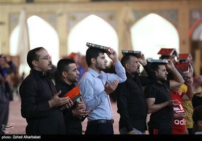 Iraqis Mark First Night of Destiny in Holy Cities