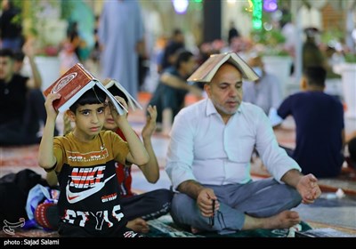 Iraqis Mark First Night of Destiny in Holy Cities