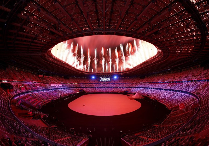 1400050115452196223242424 - گزارش لحظه به لحظه از افتتاحیه المپیک 2020 توکیو| رژه کاروان ایران با ماسک‌های متفاوت و سکوت یک دقیقه‌ای برای جانباختگان کرونا/ صدای اعتراض در بیرون ورزشگاه+عکس و فیلم
