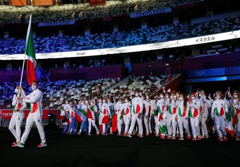 1400050116374625123242934 - گزارش لحظه به لحظه از افتتاحیه المپیک 2020 توکیو| رژه کاروان ایران با ماسک‌های متفاوت و سکوت یک دقیقه‌ای برای جانباختگان کرونا/ صدای اعتراض در بیرون ورزشگاه+عکس و فیلم