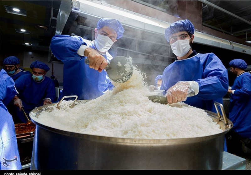 پخت 14 هزار پرس غذا به مناسبت عید غدیر خم در همدان+ تصاویر