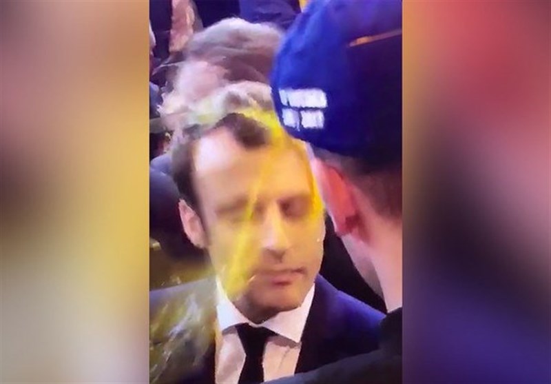 Egg on His Face: Macron Splattered by Protester on French Campaign Trail