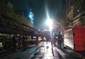 نجات فرد گرفتار شده میان آتش در آخرین لحظه‌ها + فیلم و تصاویر