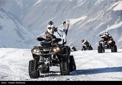 تمرین برف نوردی نیروهای تیپ ویژه صابرین با موتورهای چهارچرخ شنی دار ATV