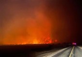 Firefighters Battle Largest Wildfire in Texas History