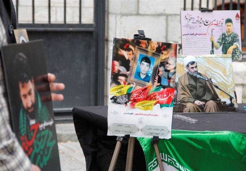 گرامیداشت شهدای حرم رضوی (ع) توسط فعالان افغانستانی در تهران
