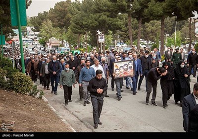 تشییع پیکر مادر شهیدان رضوان مدنی در کرمانشاه