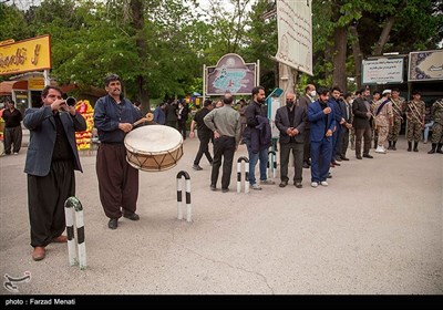 تشییع پیکر مادر شهیدان رضوان مدنی در کرمانشاه