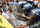 درگیری پلیس فیلیپین با معترضان به سفر بایدن