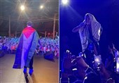 کنسرت خواننده رپ با چفیه و پرچم فلسطین در قلب پاریس