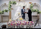 جشن ازدواج هشت زوج جوان کرمانشاهی با حضور خادمان حرم رضوی + تصویر