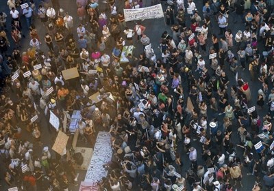  اعتراض هزاران اسپانیایی علیه سوء رفتار با مهاجران 