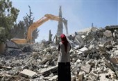 Palestinian Forced by Israel Occupation Forces to Demolish Home in Al-Quds