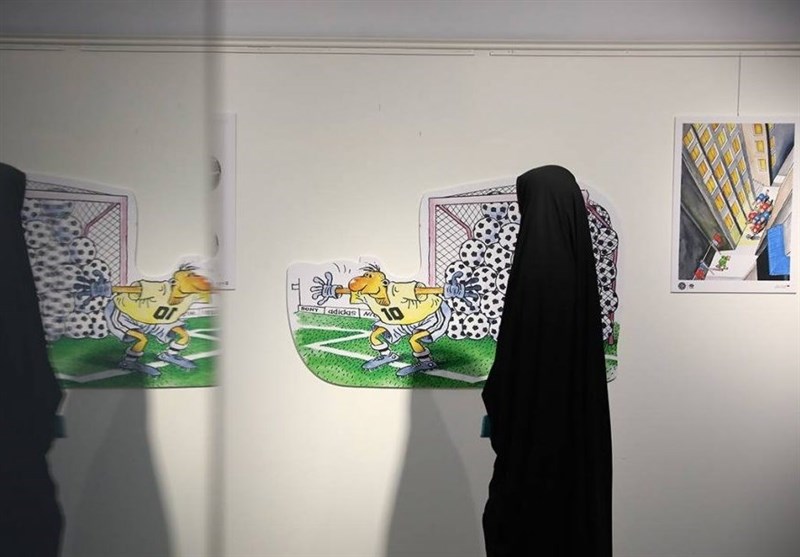 نمایش کاریکاتورهای جام جهانی 2022 قطر در حوزه هنری + عکس
