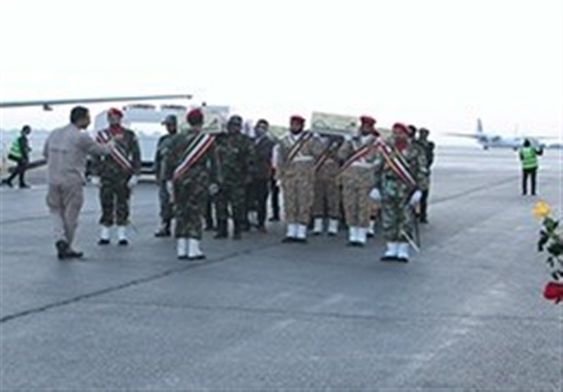 ‌استقبال از پیکر مطهر 7 شهید گمنام ‌در فرودگاه ‌شهید ‌سلیمانی اهواز