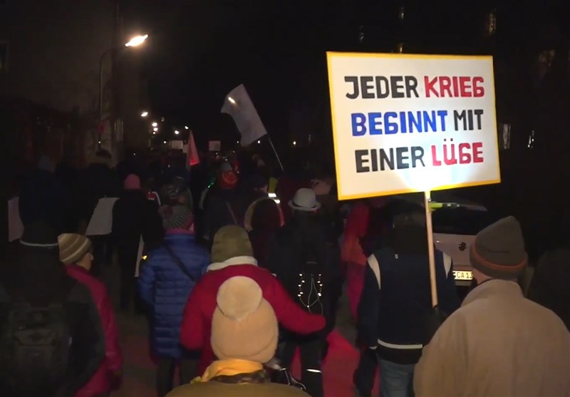 Protest Held in Munich Against Arms Deliveries to Ukraine (+Video)