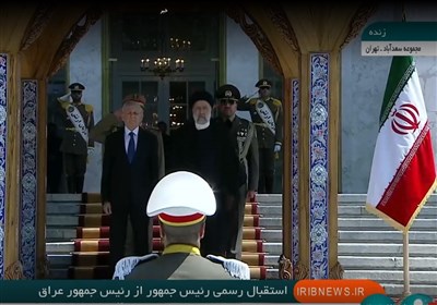  رئیسی از رئیس جمهور عراق استقبال کرد 