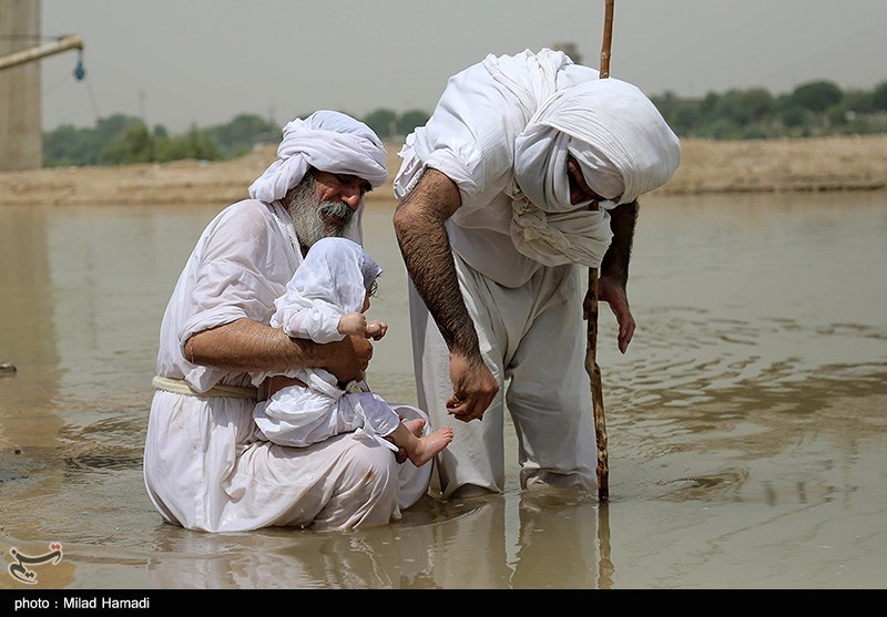 Iranian Mandaeans Perform Baptism in Karun River