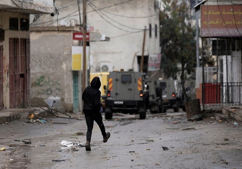 Israeli Forces Assault Palestinian Woman, Detain Youths in West Bank Raid