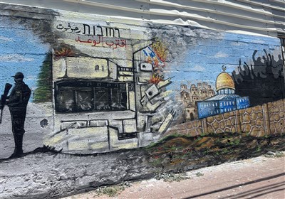 غزه؛ هنر، مقاومت و زندگی؛ کلیپ ویژه تسنیم از نقاشی دیوارنگاره‌ای زیبا در غزه همزمان با سالگرد نبرد 2014