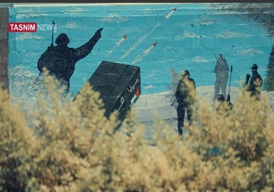 جداریة المقاومة؛ تجسید قوة ومظلومیة فلسطین على مبنى مدمر فی غزة
