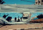 غزه؛ هنر، مقاومت و زندگی/ کلیپ ویژه تسنیم از نقاشی دیوارنگاره‌ای زیبا در غزه همزمان با سالگرد نبرد 2014