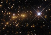 Hubble Telescope Reveals Massive Galaxy Cluster &apos;Cosmic Monster&apos; in Distant Universe