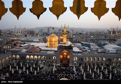 Imam Reza (AS) Holy Shrine’s Flag Replaced on Eve of Muharram