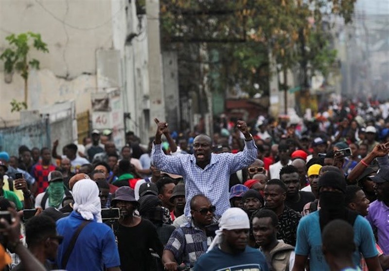 Haitian Gang Leader Vows to &apos;Fight&apos; Prime Minister, Violence Surges