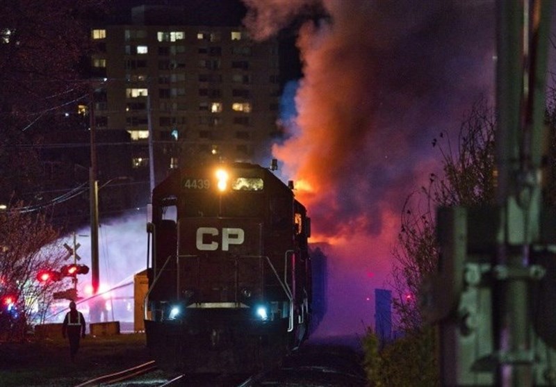 Train on Fire Rolls through City in Canada
