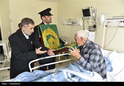 پرچم متبرک حرم مطهر رضوی در بیمارستان امام حسن(ع) بجنورد