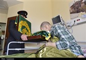 پرچم متبرک حرم مطهر رضوی در بیمارستان امام حسن(ع) بجنورد