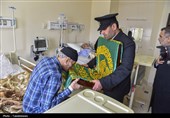 پرچم متبرک حرم مطهر رضوی در بیمارستان امام حسن(ع) بجنورد