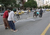 آماده‌سازی خیابان امام رضا(ع) مشهد برای تشییع شهید جمهور