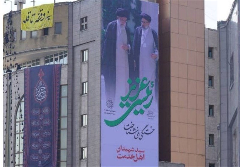 نصب دیوارنگاره &quot;شهید جمهور&quot; بر ساختمان شهرداری منطقه10 تهران