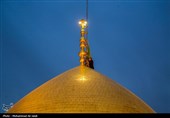 آیین تعویض پرچم گنبد حرم مطهر حضرت معصومه(س)
