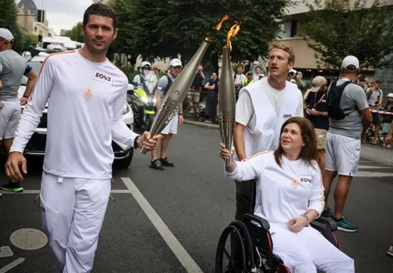 Lebanese Journalist Wounded in Israeli Strike Carries Olympic Torch