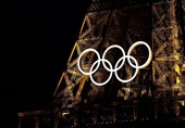 Иллюминация Эйфелевой башни перед стартом Олимпийского огня
