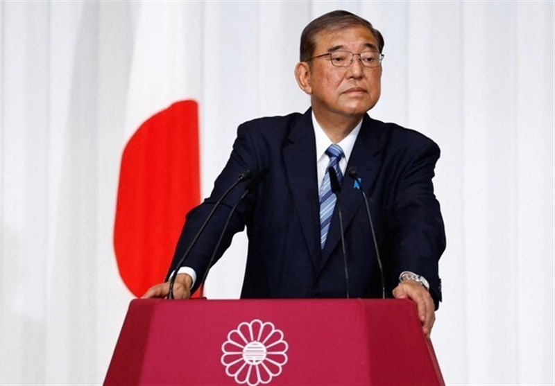 Japan PM Vows to Stay On despite Election Debacle