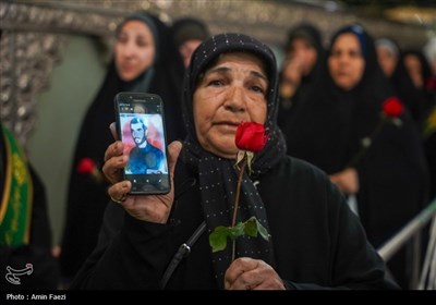 آیین غبارروبی مضجع شریف حضرت احمدبن موسی الکاظم علیهماالسلام و گلباران قبور شهدا،