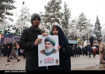 گرمای دل‌ها در هوای برفی گلزار شهدای کرمان