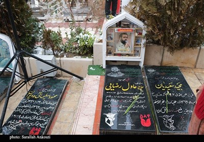 گرمای دل‌ها در هوای برفی گلزار شهدای کرمان