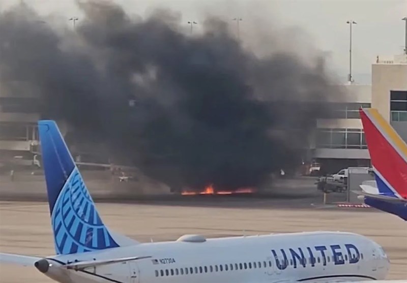 Passengers Evacuate Onto Wing After American Airlines Engine Fire at Denver Airport