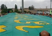 اهتزاز پرچم امام رضا (ع) بر بام شهرستان بیرجند
