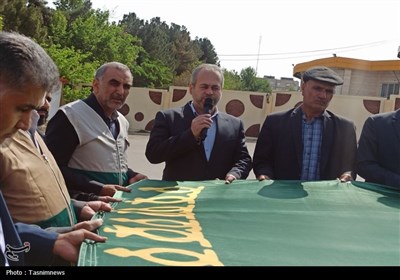 اهتزاز پرچم مطهر حرم رضوی در استانداری خراسان شمالی